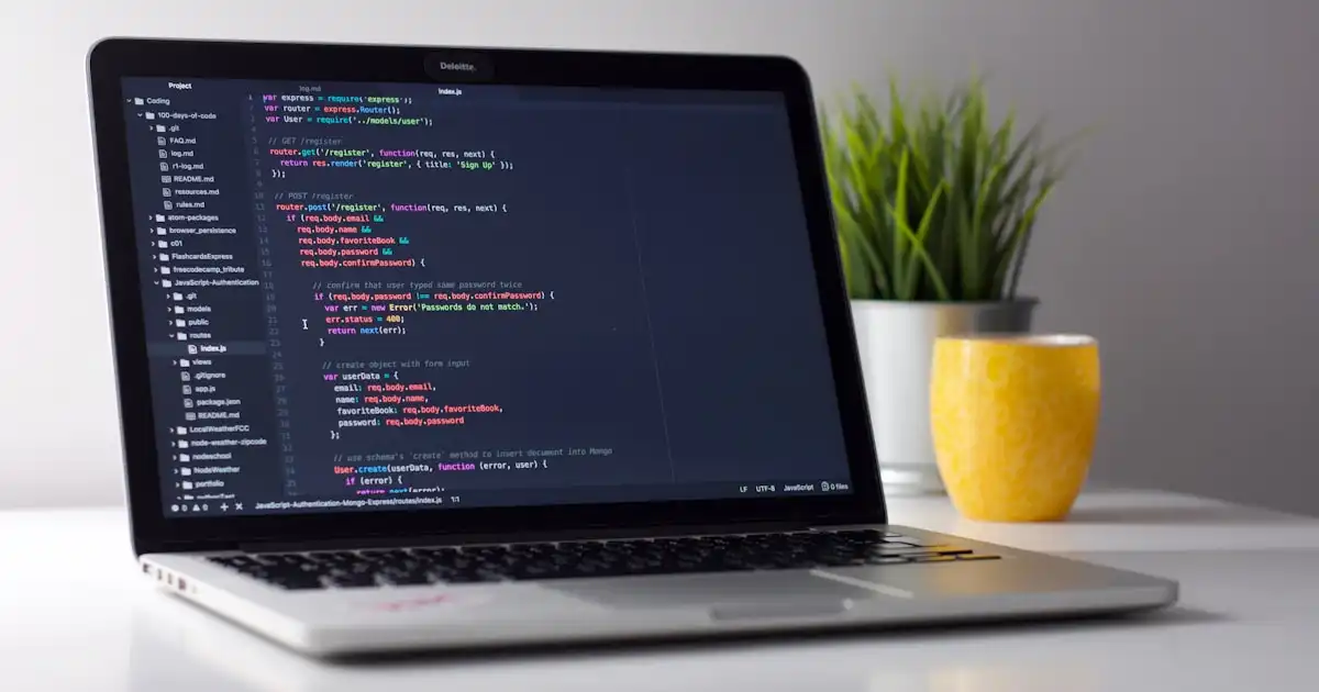 Person working on laptop creating digital products
